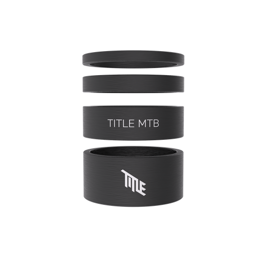 Title styreafstandsstykke-sæt i mat UD carbon, 3, 5, 10 og 15 mm, stablede
